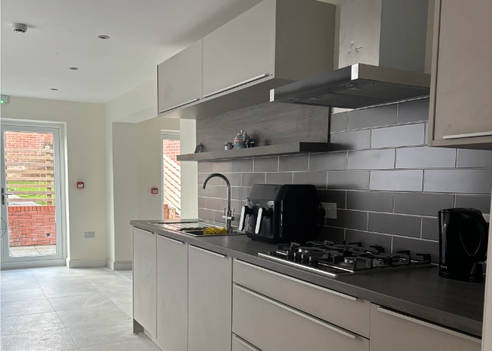Photo placeholder: shared kitchen and dining area